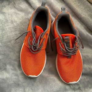 Bright orange Nikes size 2.5 Y worn once
